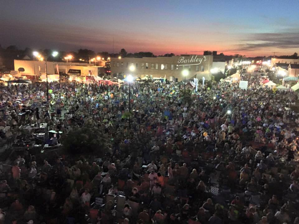 Town gathered at night